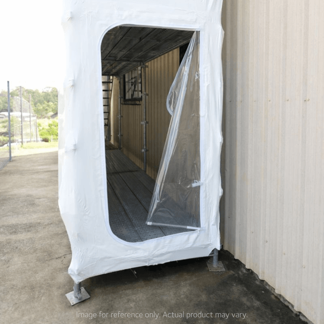 Sitemax | Clear zipper vinyl access door installed in Shrinkclad shrink wrap and Scafclad encapsulation system, providing weatherproof, dust-controlled site access for contained construction areas